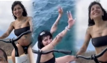 Cazzu lució su avanzado embarazo en redes con un video haciendo ciclismo acuático
