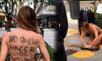 Una artista hizo una protesta desnuda en calle Florida y le realizó RCP a su guitarra
