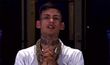 L-Gante cantó el himno en Casa Rosada por cadena nacional y las redes no lo perdonaron